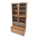 Mid century teak bookcase on cupboard,