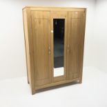 Light oak triple wardrobe, two doors flanking central mirror, stile supports, W133cm, H186cm,