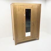 Light oak triple wardrobe, two doors flanking central mirror, stile supports, W133cm, H186cm,