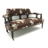 Late Victorian walnut framed settee,