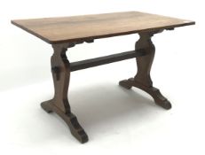 Oak rectangular stretcher table, shaped solid end supports,