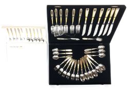 Unused Japanese Dinner Mate 32-piece canteen of stainless steel and gold plated cutlery, boxed,
