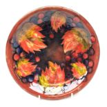 William Moorcroft Leaf & Berry Flambe circular plate,