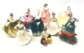 Nine Royal Doulton figures comprising Janine, Ruth, Ninette, Margaret, Lynne, Angela, First Prize,