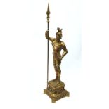 20th century brass fire iron stand in the form of a knight in armour on pierced shaped base,