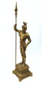 20th century brass fire iron stand in the form of a knight in armour on pierced shaped base,