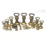 Collection of Avery and other brass bell weights,