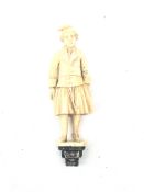 19th century ivory novelty needle or bodkin case carved as a Dutch figure of a man in a cap,
