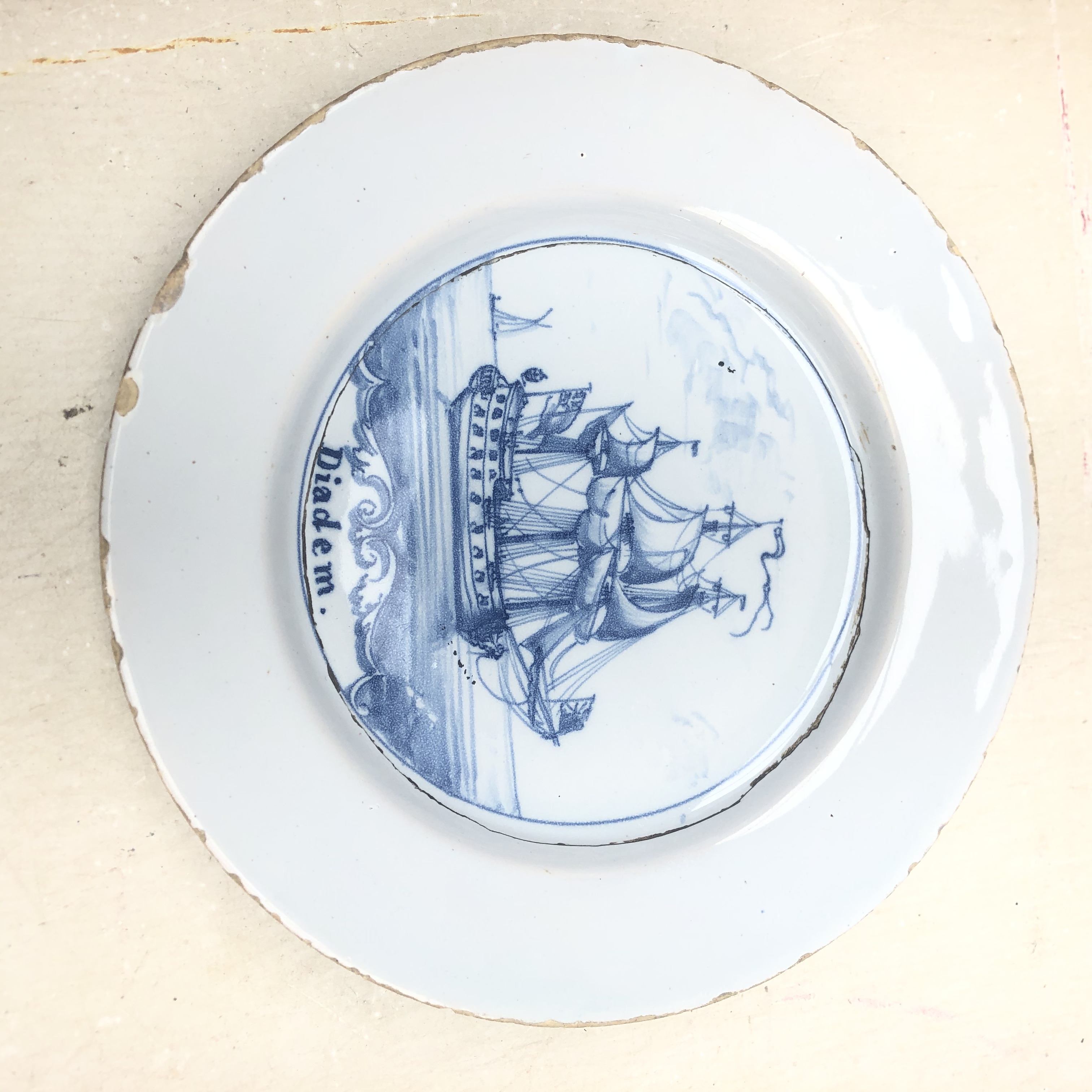 18th century English Delft plate painted with a three masted ship ' 'Diadem', - Image 2 of 3