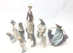 Collection of Lladro figures comprising 'May Dance' no. 5662, Girl with Dog no.