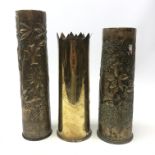 Three WW1 Trench Art Shell cases inscribed 'The Great War' and two others with floral embossed