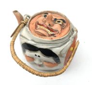 Japanese 'Banko' five faces teapot with cane work handle,