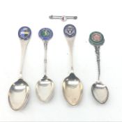 Four silver & enamel Tennis tea spoons and a 1897 Berlin Tennis brooch (5) Condition