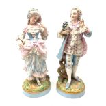 Pair of large 19th century Meissen bisque porcelain figures depicting a young lady and gentleman in