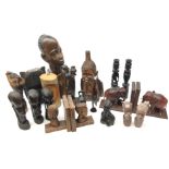 Large carved African bust of a gentleman H45cm, similar African carvings of figures, candlesticks,