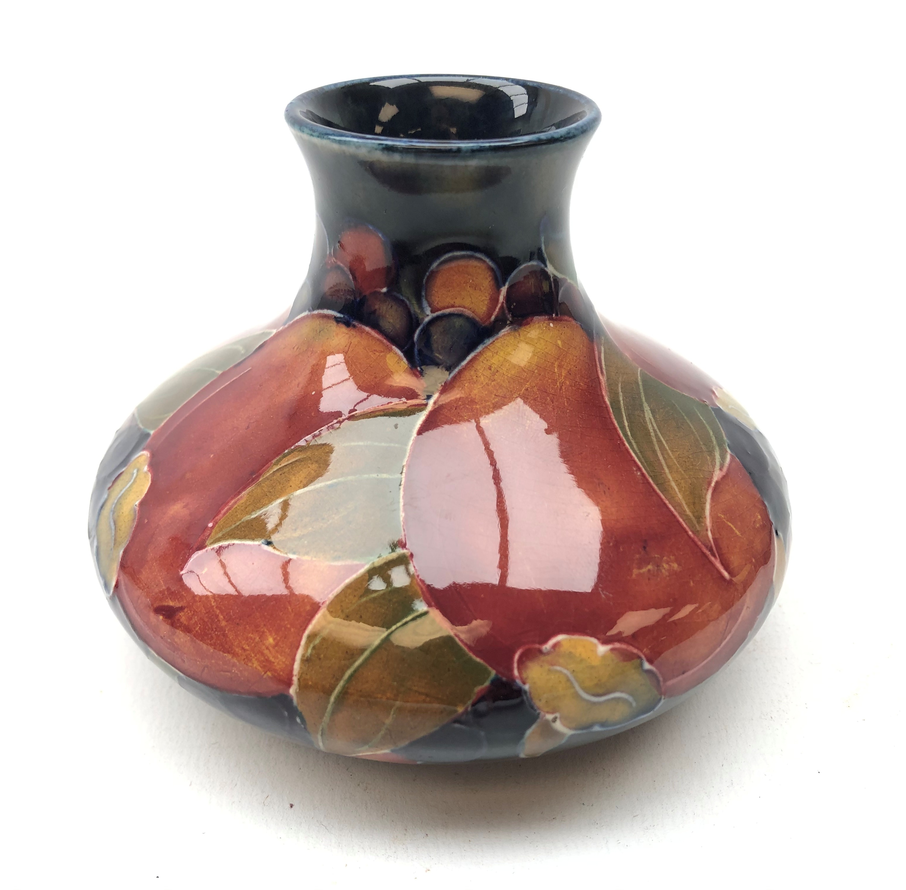 William Moorcroft Pomegranate pattern squat vase, c1916 H8.