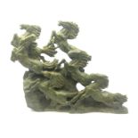 Large soapstone carving of racing horses,