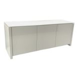 Calligaris gloss white sideboard, glass top, three cupboards enclosing glazed shelves, W193cm,
