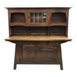 Early 20th century Arts & Crafts Leonard Wyburd for Liberty Design oak dresser fitted with single