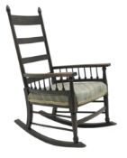 Early 20th century William Birch for Liberty's style Arts and Crafts oak ladder back rocking chair