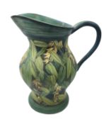 Jackie Walton, large studio pottery jug inscribed and painted with foliage,