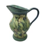 Jackie Walton, large studio pottery jug inscribed and painted with foliage,