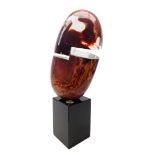 Dino Rosin (Italian 1948-): Large Murano Calcedonia glass sculpture 'Omega' raised on rectangular