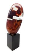 Dino Rosin (Italian 1948-): Large Murano Calcedonia glass sculpture 'Omega' raised on rectangular