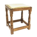 'Mouseman' oak stool with leather top,