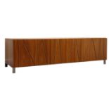 Dwell Furniture walnut low console unit, two fall front units flanking single central drawer,