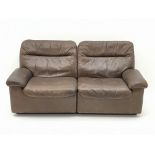 De Sede Ds 66 two seat sofa upholstered in chocolate brown leather, designed by Carl Larsson,