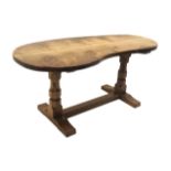 'Mouseman' hand adazed burr oak kidney shaped twin octagonal pedestal dining table joined by single