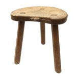 'Mouseman' oak three legged stool, dished adzed seat by Robert Thompson of Kilburn,