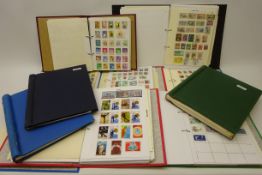 Collection of World stamps in ten albums/folders including Queen Victoria and later Canada, Bolivia,