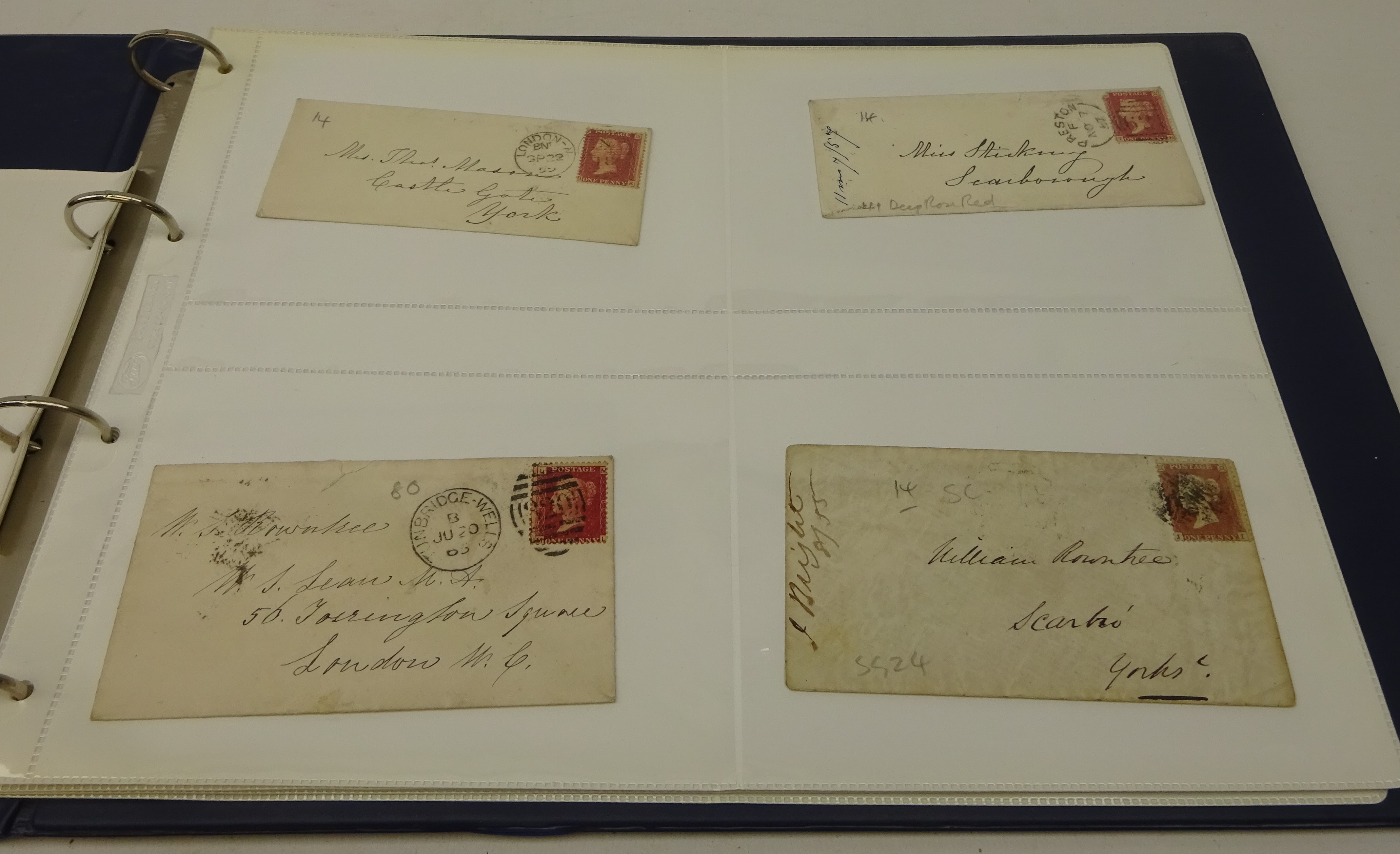 Thirty Queen Victoria penny red stamps on covers,