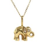 14ct gold cubic zirconia elephant pendant stamped 585, on gold chain,