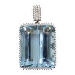 18ct white gold diamond and blue stone set pendant,