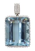 18ct white gold diamond and blue stone set pendant,