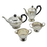 Silver four piece tea set by E H P Co Ltd, Sheffield 1972, approx 45.