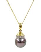 Gold Tahitian cultured pearl and diamond pendant, stamped 18K, on 9ct gold necklace,