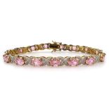 Silver-gilt diamond chip and pink stone set bracelet,