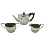 Victorian silver three piece bachelors tea set by Joseph Gloster, Birmingham 1897, approx 13.