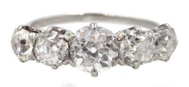 Platinum graduating five stone old cut diamond ring, central diamond approx 0.