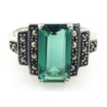 Silver stepped marcasite and green stone ring,