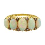 Gold graduating five stone oval opal and diamond ring,