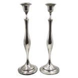 Pair of tall Edwardian silver weighted candlesticks Rd.