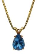 Gold pear shaped blue topaz pendant, on 18ct gold box link chain necklace,