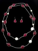 Faceted ruby and pearl silver (tested) necklace and pair of similar earrings,