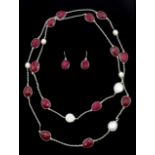 Faceted ruby and pearl silver (tested) necklace and pair of similar earrings,