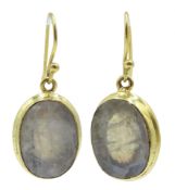 Pair of silver-gilt moonstone pendant earrings,